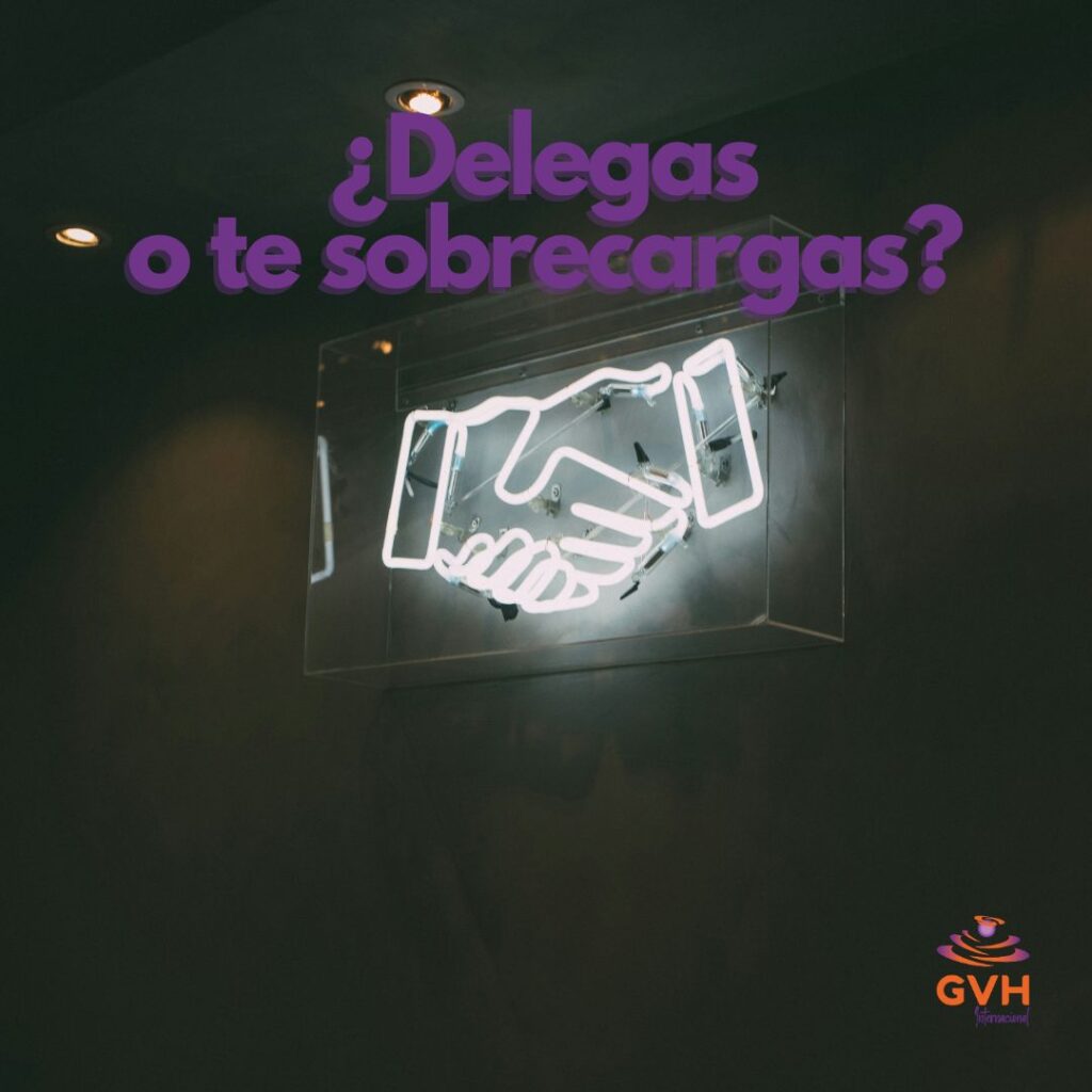 letrero de neon con dos manos saludandose